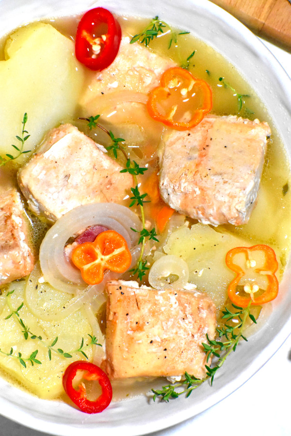 close up image of bahamian boiled fish in a white bowl